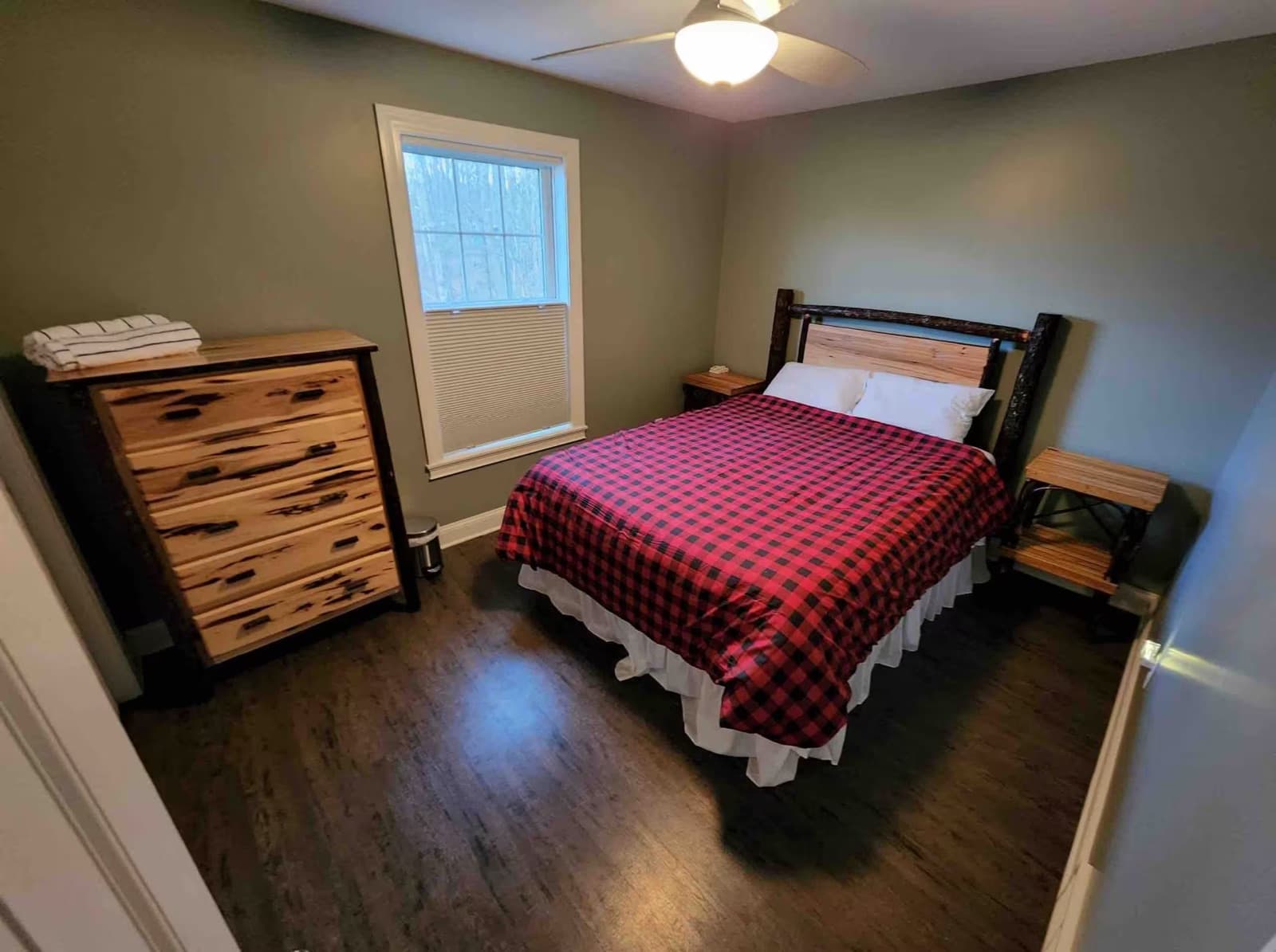 Guest bedroom with cozy plaid bedding